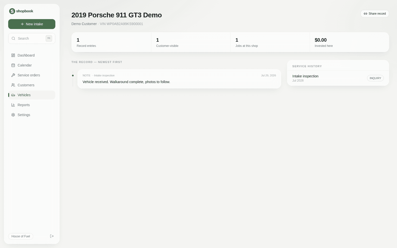 A vehicle page: documented history, photo gallery, invested total, and share link.